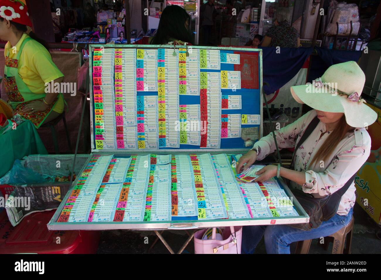 Chiang Mai market, Thailand lottery seller in street Stock Photo - Alamy