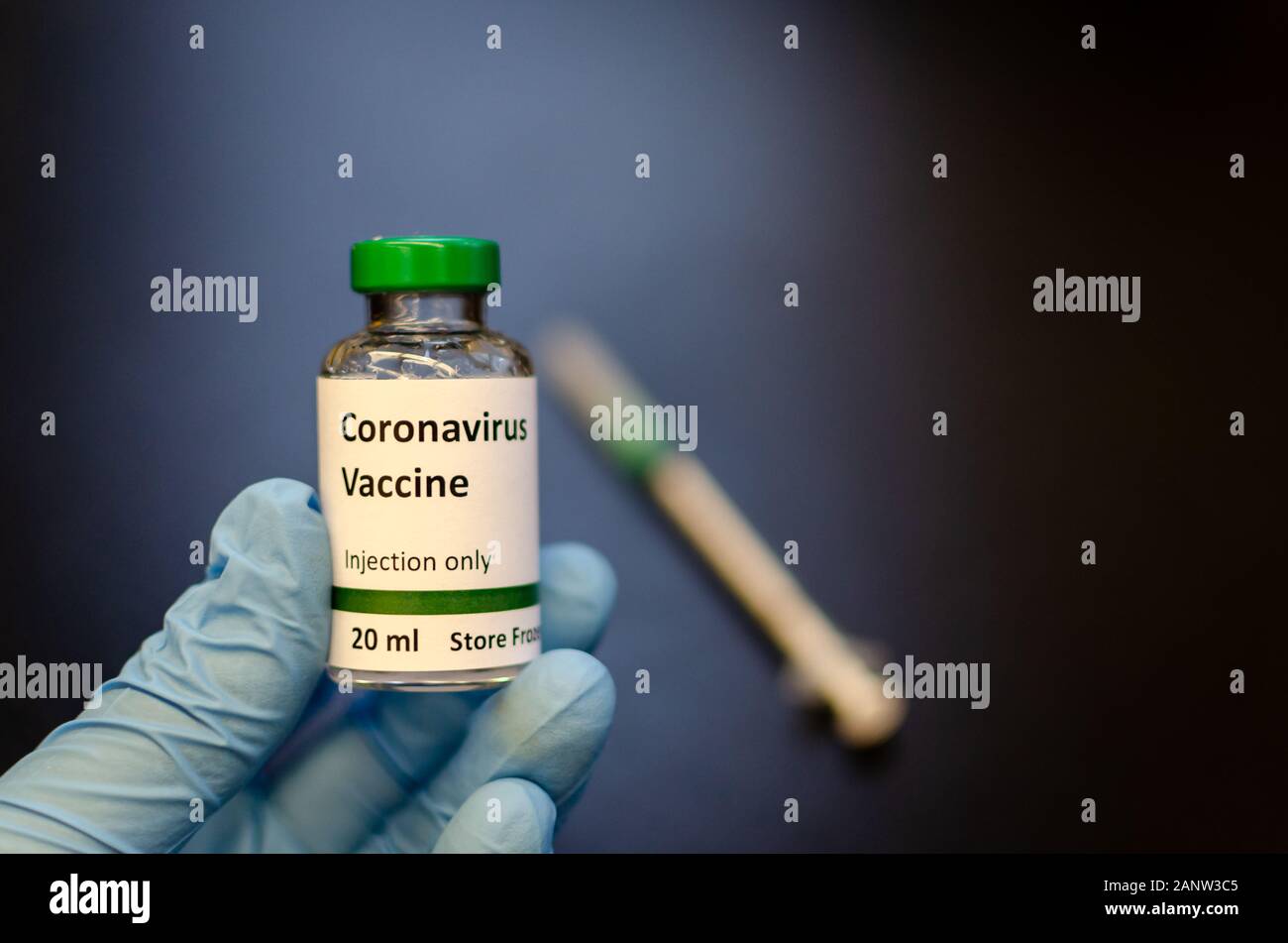 Coronavirus vaccine vial with injection syringe Stock Photo