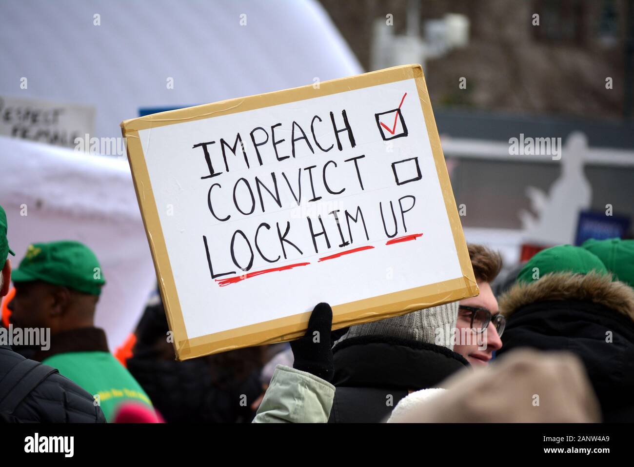 People holding signs at the 'Rise and Roar' Women's March from Lower Manhattan to Time's Square. Stock Photo