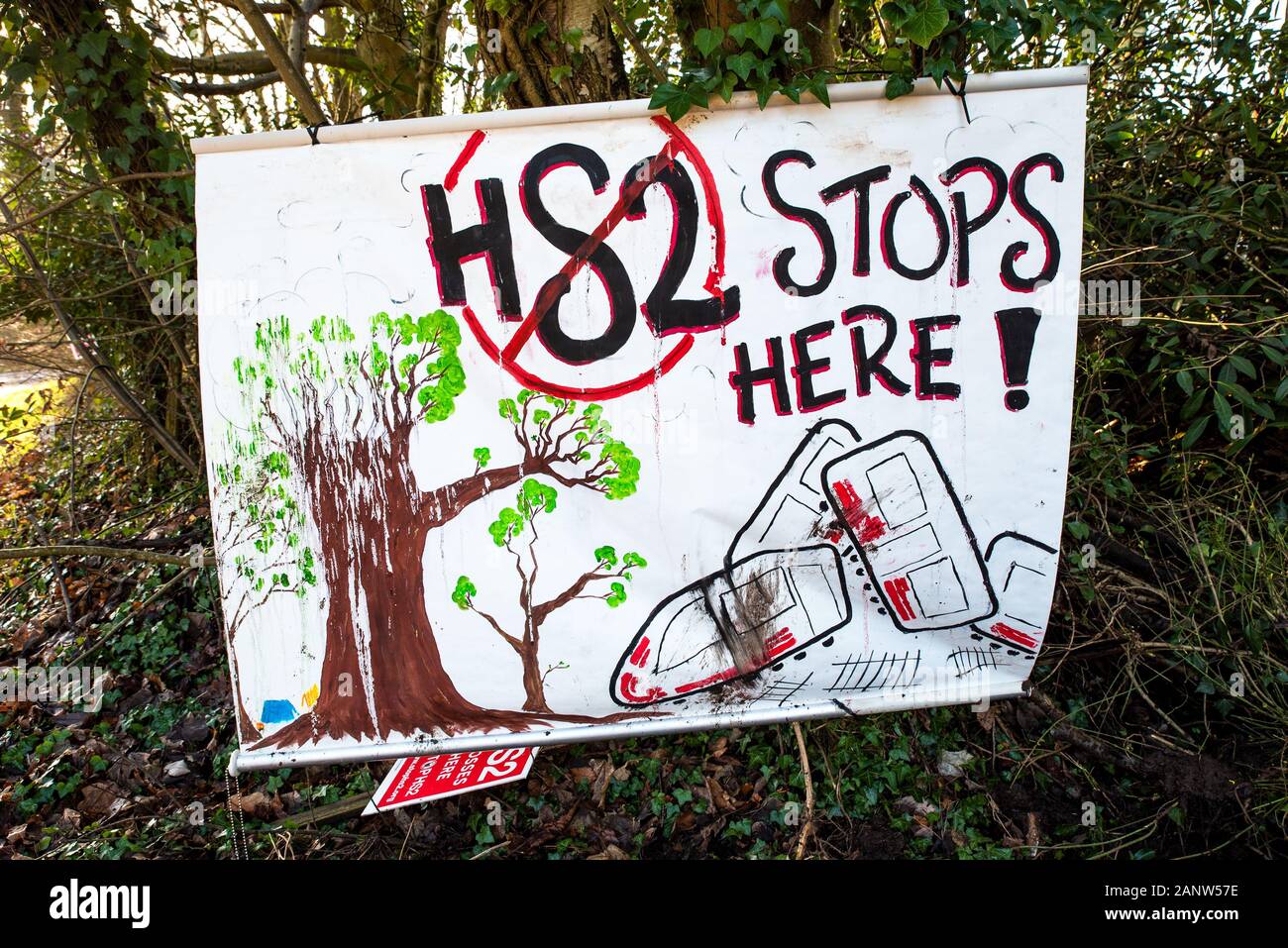 Wendover, Buckinghamshire, UK.18th January 2020. Determined campaigners opposing HS2 recently established the Wendover Active Resistance Camp in woodland south of Wendover adjacent to the the A413. The camp is in the path of the proposed HS2 rail line where it would cross the A413. The Wendover Active Resistance Camp intend to occupy their site for as long as possible, opposing the construction of the HS2 rail line. Placards warn passing motorists that the HS2 rail line will cross here, and a banner indicates HS2 will be stopped here. Credit: Stephen Bell/Alamy Stock Photo
