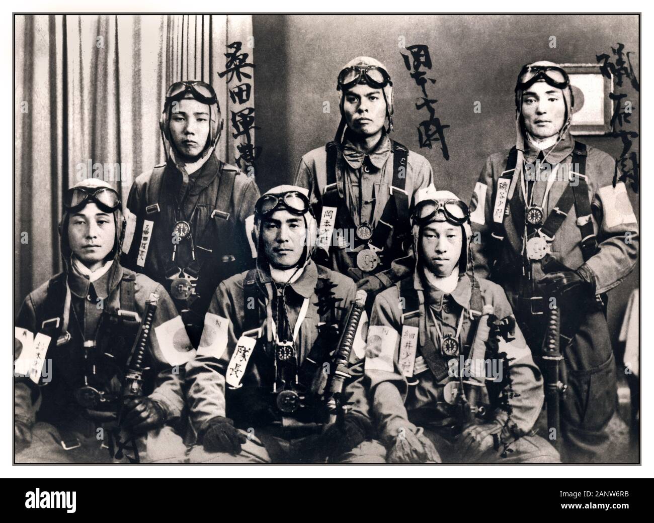 KAMIKAZE PILOTS Vintage 1940’s WW2 Image of a group of Japanese Kamikaze suicide pilots posing for a signed group photo to immortalise them before their final suicide flights as guided flying missiles in the Pacific War against the American Fleet. Japanese 'Kamikaze' or suicide pilots were used to attack Pearl Harbor World War II Second World War WWII JAPAN Stock Photo