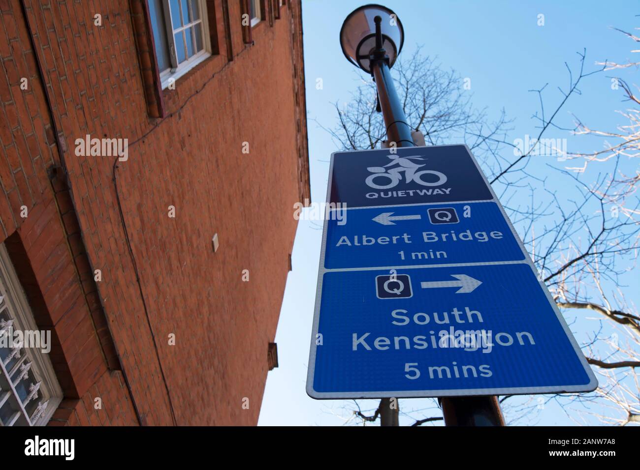 direction sign for a london cycle quietway route, giving directions and timings to albert bridge