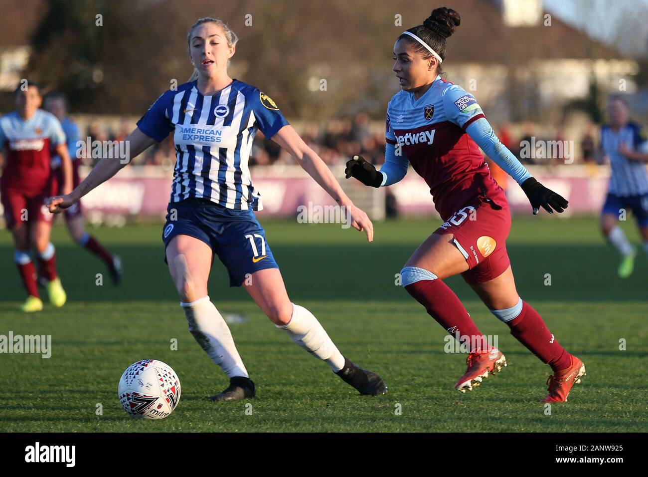 Romford, UK. 19th Jan 2020. Jacynta Galabadaarachchi of West Ham United Women getting past Megan Connolly of Brighton and Hove Albion Women during the Barclays FA Women's Super League match between West Ham United and Brighton and Hove Albion at the Rush Green Stadium, Romford, London on Sunday 19th January 2020. (Credit: Jacques Feeney | MI News) Credit: MI News & Sport /Alamy Live News Stock Photo