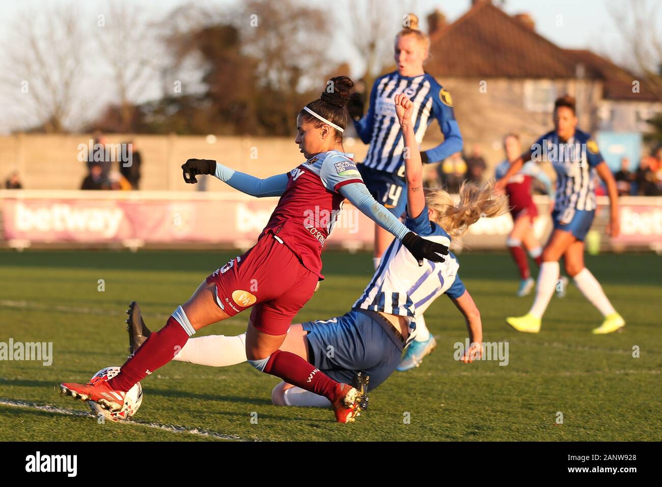 Romford, UK. 19th Jan 2020. Megan Connolly of Brighton and Hove Albion Women blocking the cross from Jacynta Galabadaarachchi of West Ham United Women during the Barclays FA Women's Super League match between West Ham United and Brighton and Hove Albion at the Rush Green Stadium, Romford, London on Sunday 19th January 2020. (Credit: Jacques Feeney | MI News) Credit: MI News & Sport /Alamy Live News Stock Photo