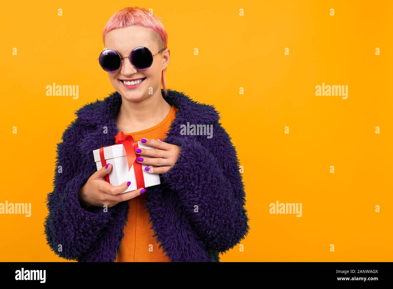 Girl With Pink Hair With A Piercing On Her Nose Dressed In A Fur