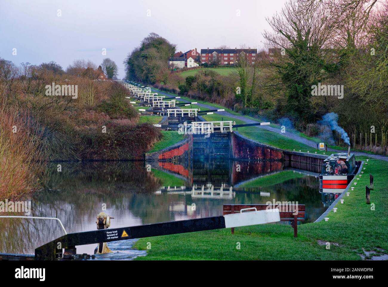Winter Evening at main flight of Caen Hill Locks on the Kennet & Avon Canal, Devizes, Wiltshire  Viewed from Upper Foxhangers Bridge Stock Photo