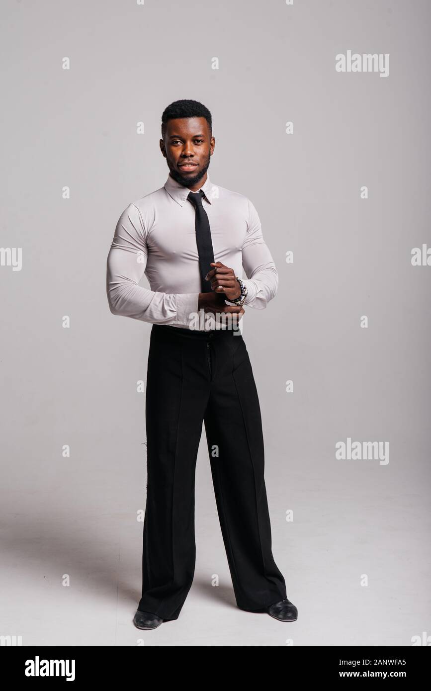 Happy confident young african american business male smiling with confidence, executive stylish company leader. Portrait of an businessman wearing Stock Photo
