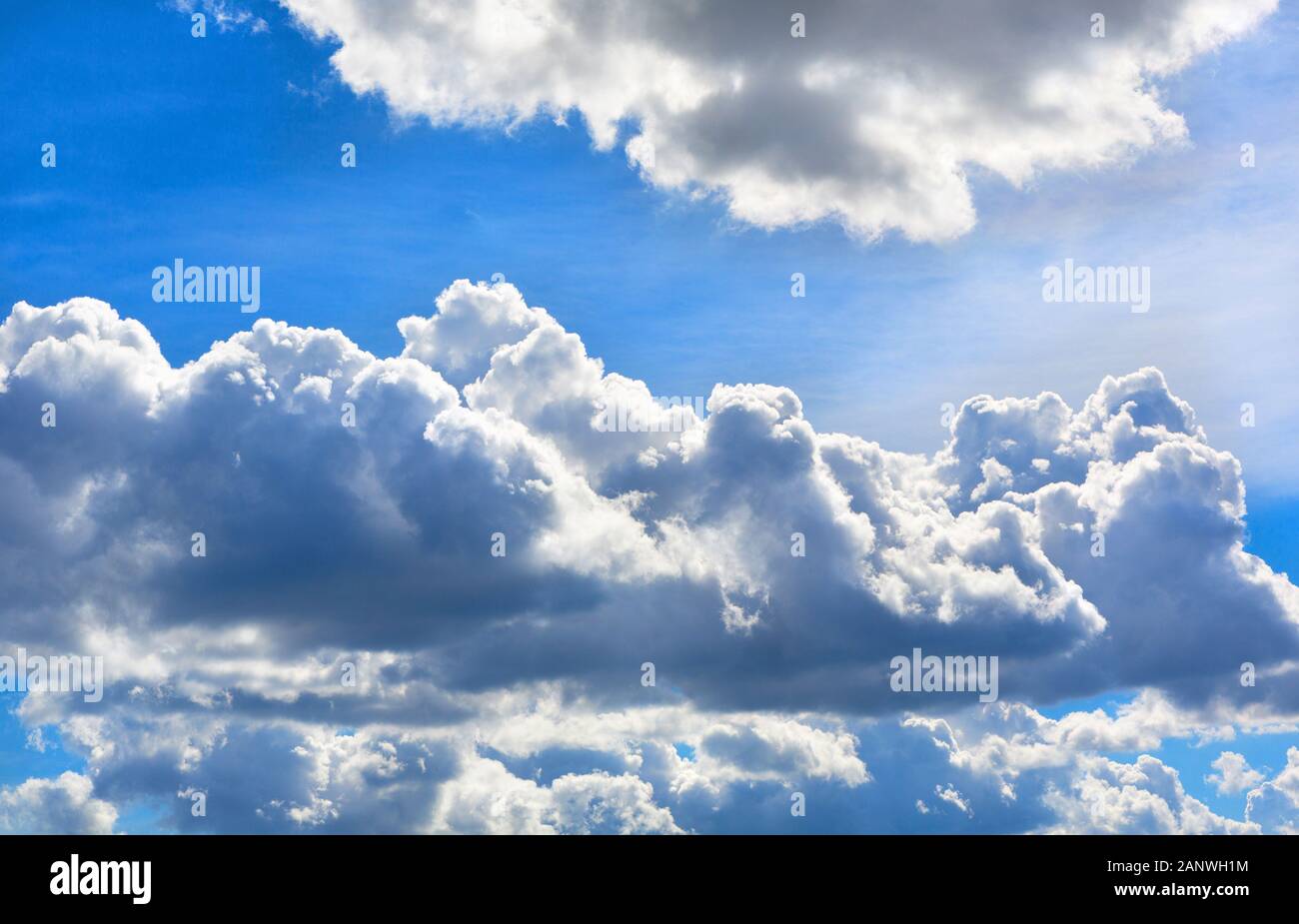 Blue sky background with clouds. Sky with Clouds in a sunny day. Stock Photo