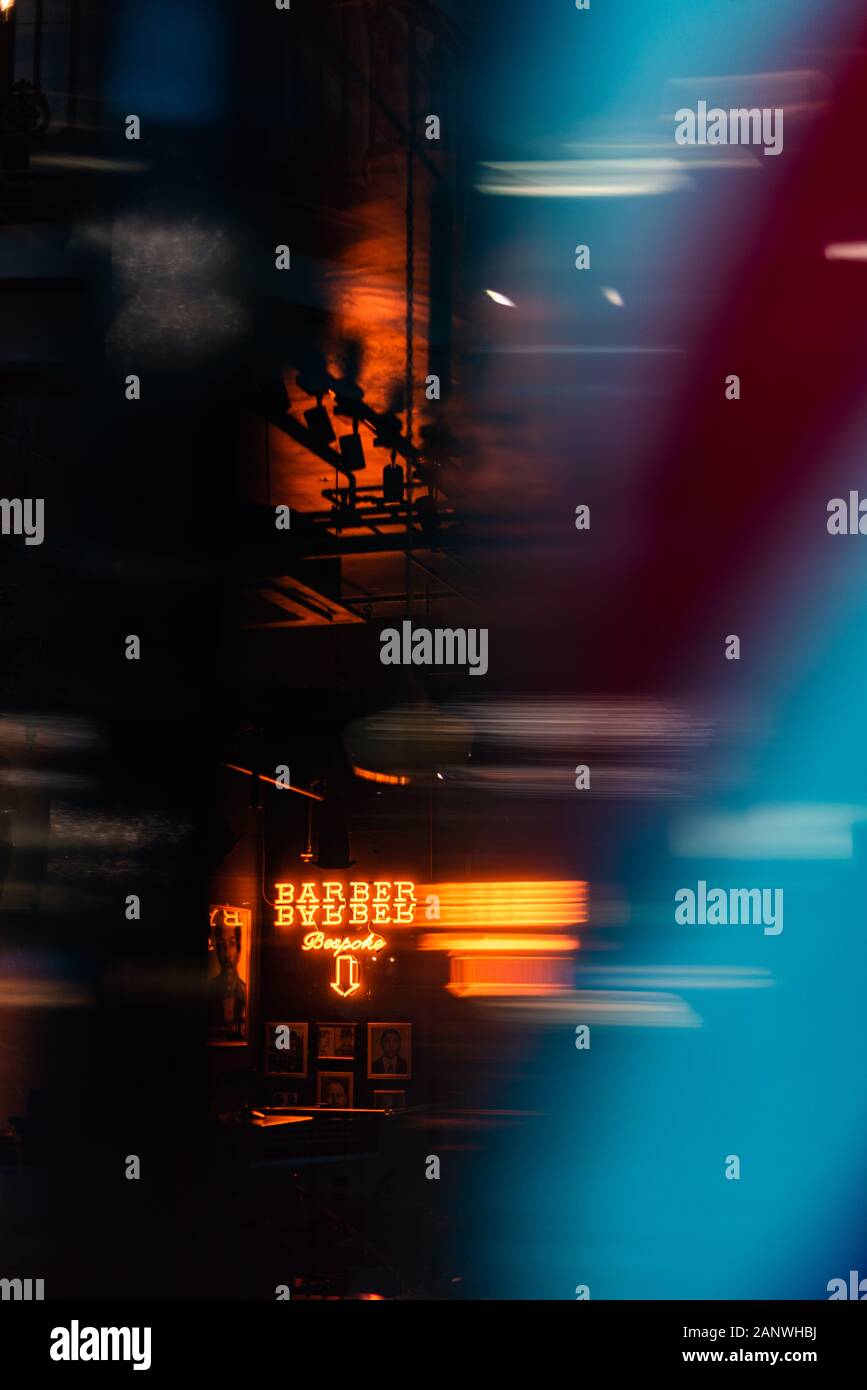 Close up of neon open sign barber blur bokeh abstract space for text ad ...