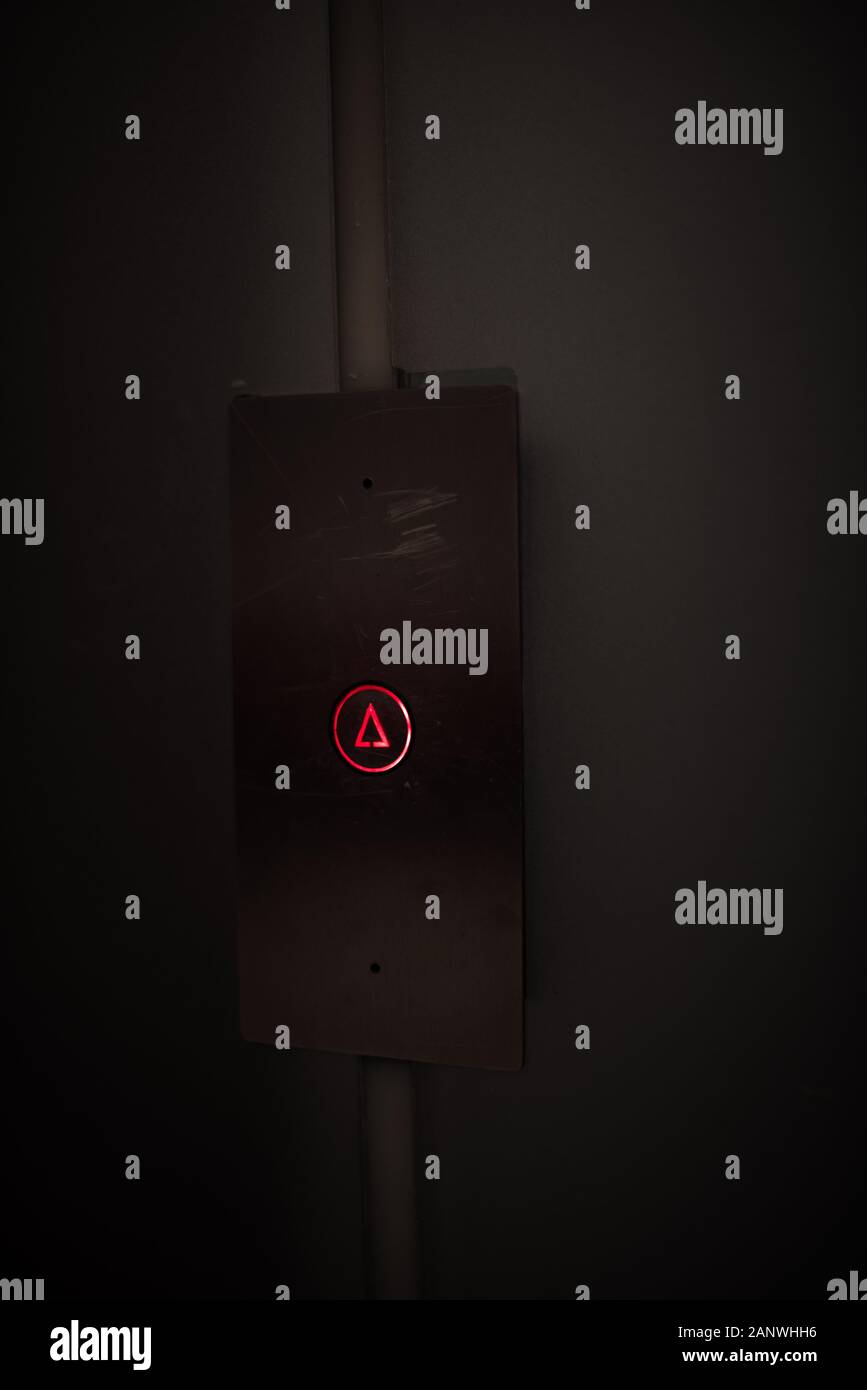Elevator Button up red on stainless plate concept business dark detail ...