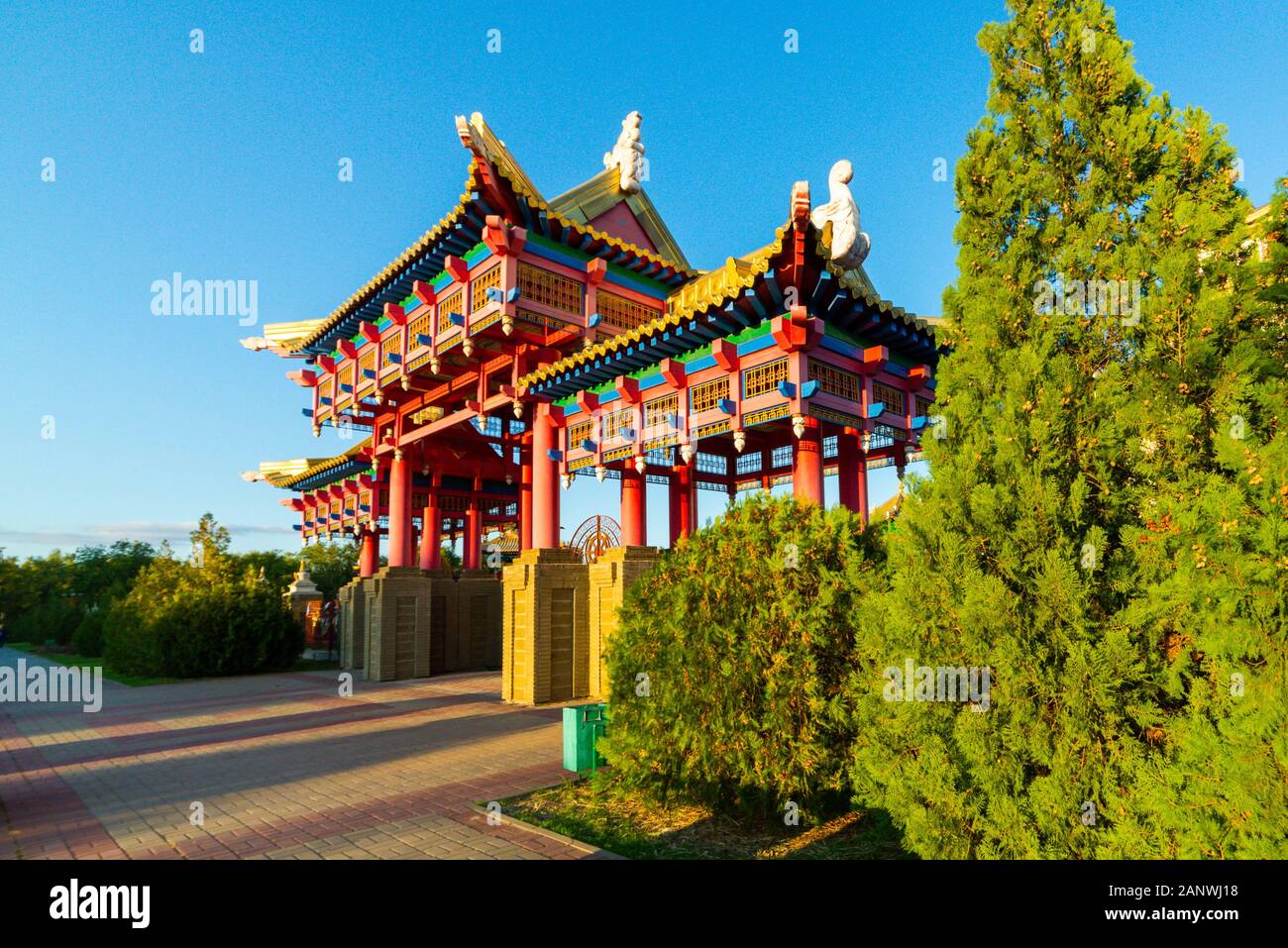 Gate to the Buddhist temple. Om mani padme hum or O, the jewel in the lotus, the mystic formula of the Tibetans and nothern Buddhists used as a charm. Stock Photo