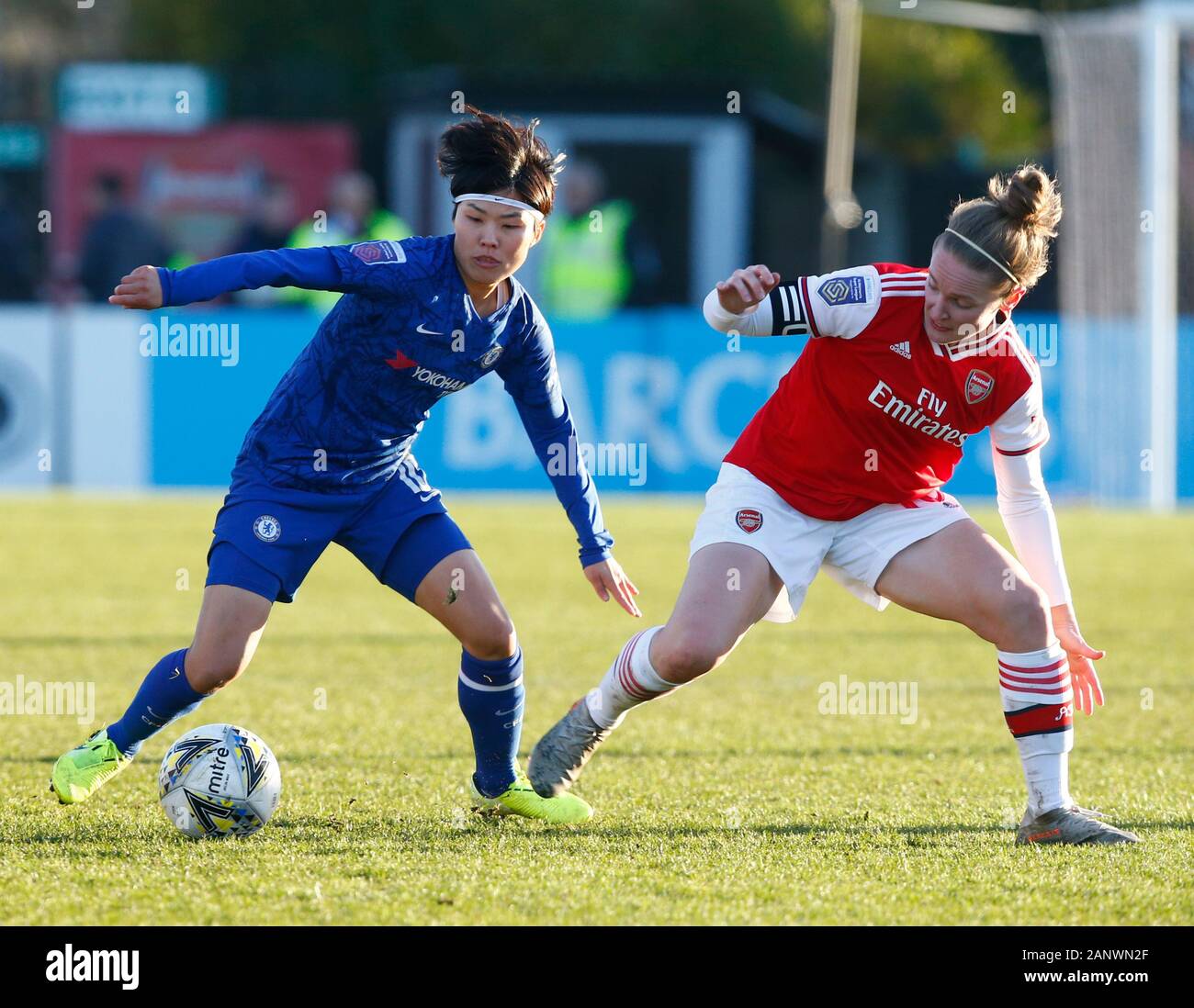 BOREHAMWOOD, ENGLAND - JANUARY 19: L-R Chelsea Ladies Ji So Yun and Kim Little of Arsenal during Barclays Women's Super League match between Arsenal W Stock Photo