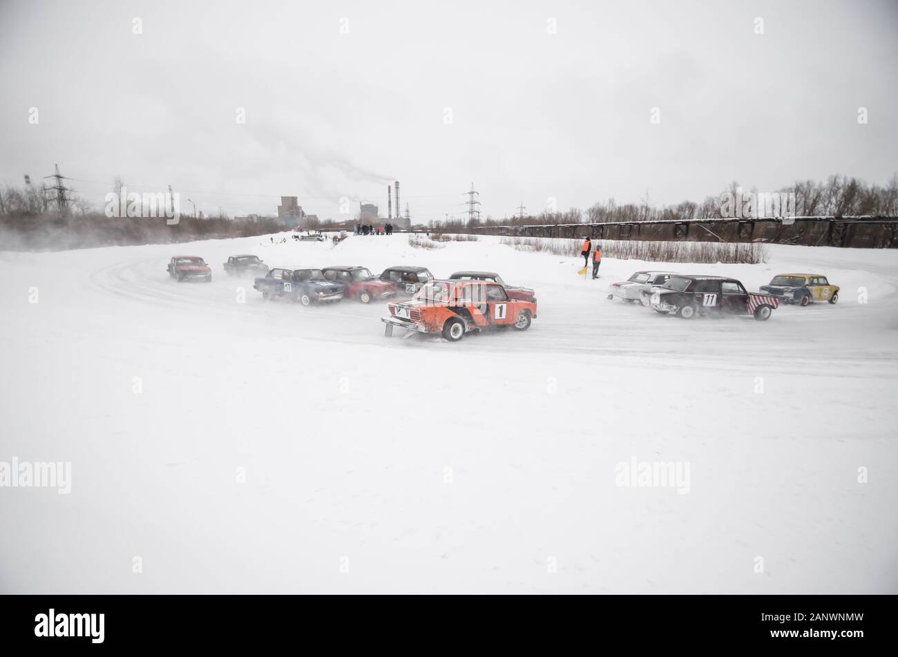 Winter racing on the ice track. Russian racing car company Lada. Stock Photo