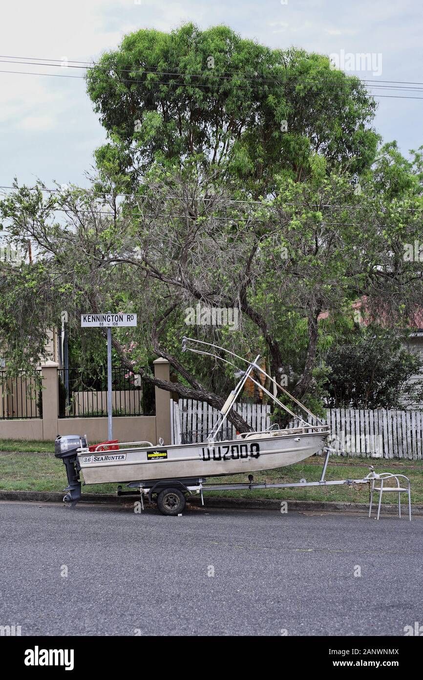 Boat out front - Post War Houses in the  suburbs of Carina, Camp Hill, Seven hills, their topography and modern 'new queenslander' equivalents Stock Photo