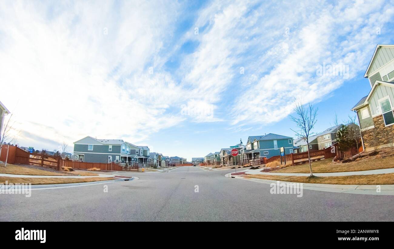 Driving through new residential neighborhood in suburbia Stock Photo