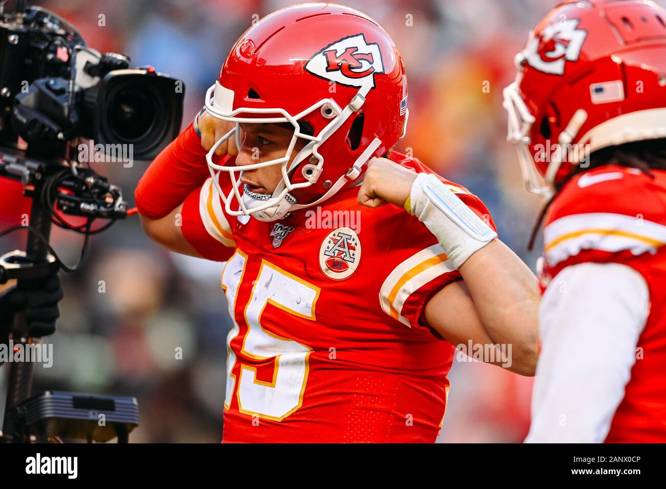 Kansas City, United States. 19th Jan, 2020. Kansas City Chiefs quarterback  Patrick Mahomes (15) flexes his muscles after a scoring a touchdown on a  twenty seven yard run against the Tennessee Titans