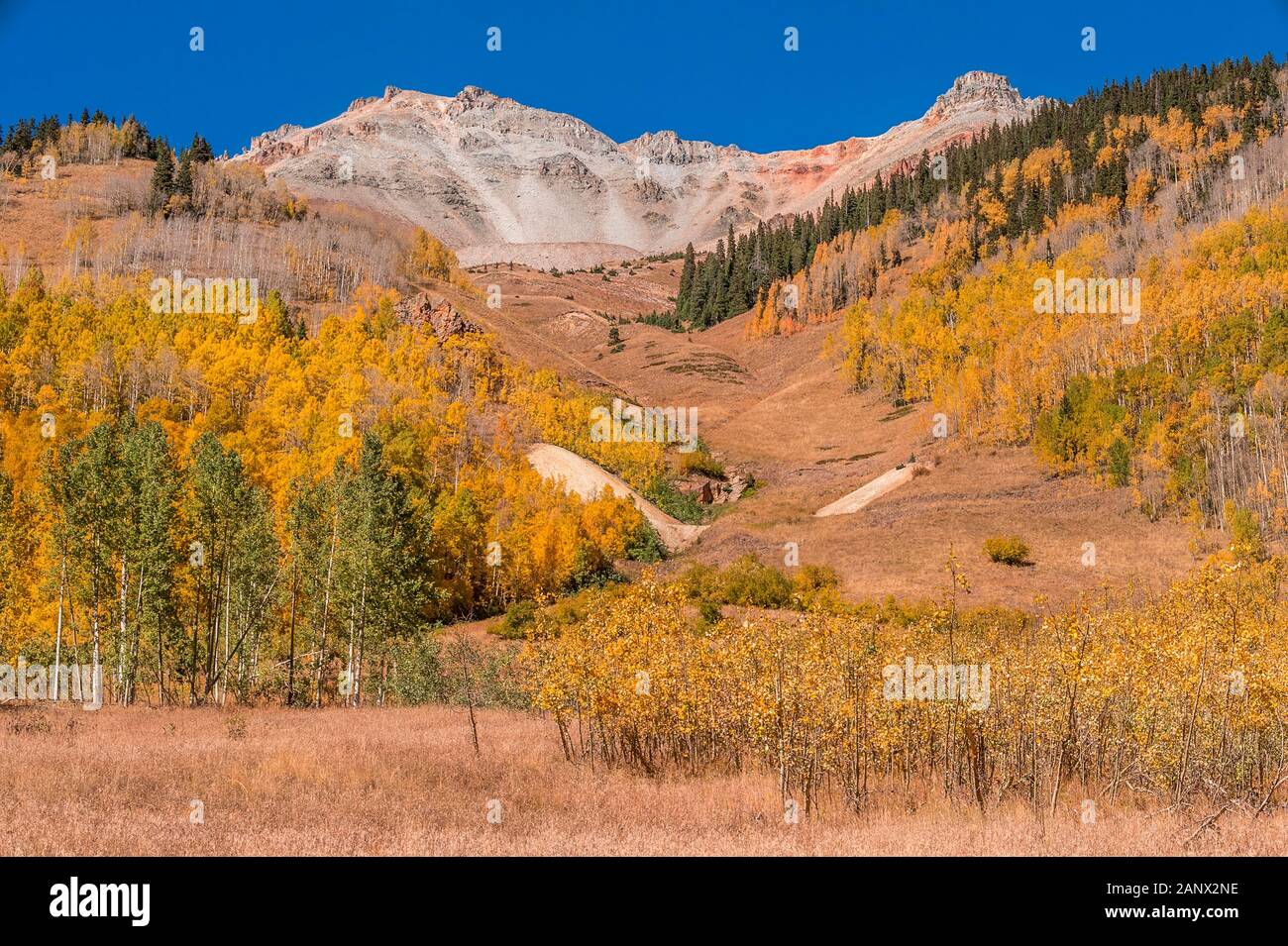 A mountainside with iron at the mountain peak along Ophir Pass near Telluride, Colorado. Stock Photo