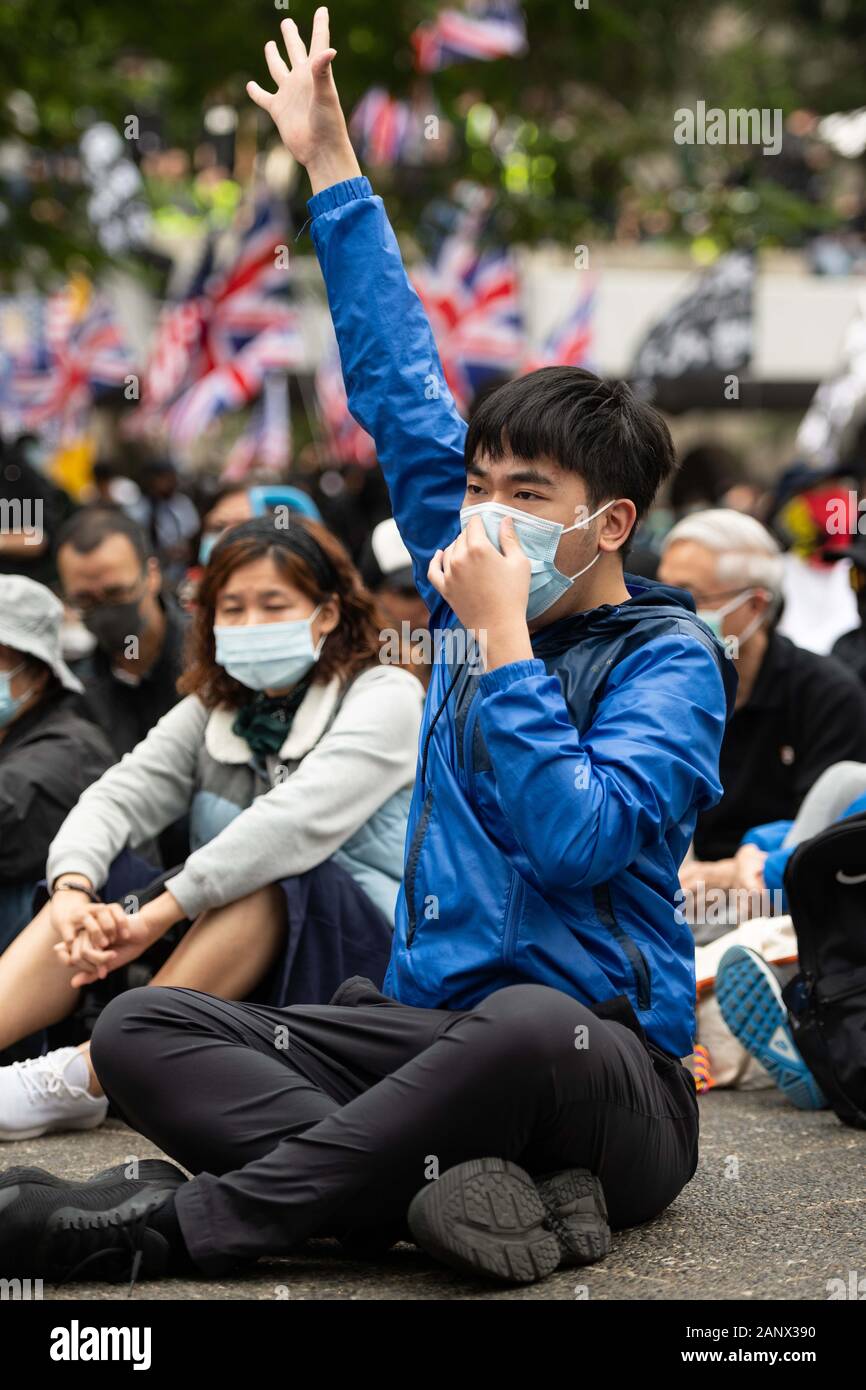 Hong Kong. January 18, 2020, Hong Kong, Hong Kong, Hong Kong, China: What started as a peaceful demonstration in Chater Garden, quickly eroded into chaos. Protesters Began their march east toward Causeway Bay, chanting there demands. Shortly after their march began they were soon confronted by a wall of police. Within minutes the peaceful march exploded into mayhem. Police blanketed the area with tear gas, dividing the crowd and sending protesters scattering. Credit: ZUMA Press, Inc./Alamy Live News Stock Photo