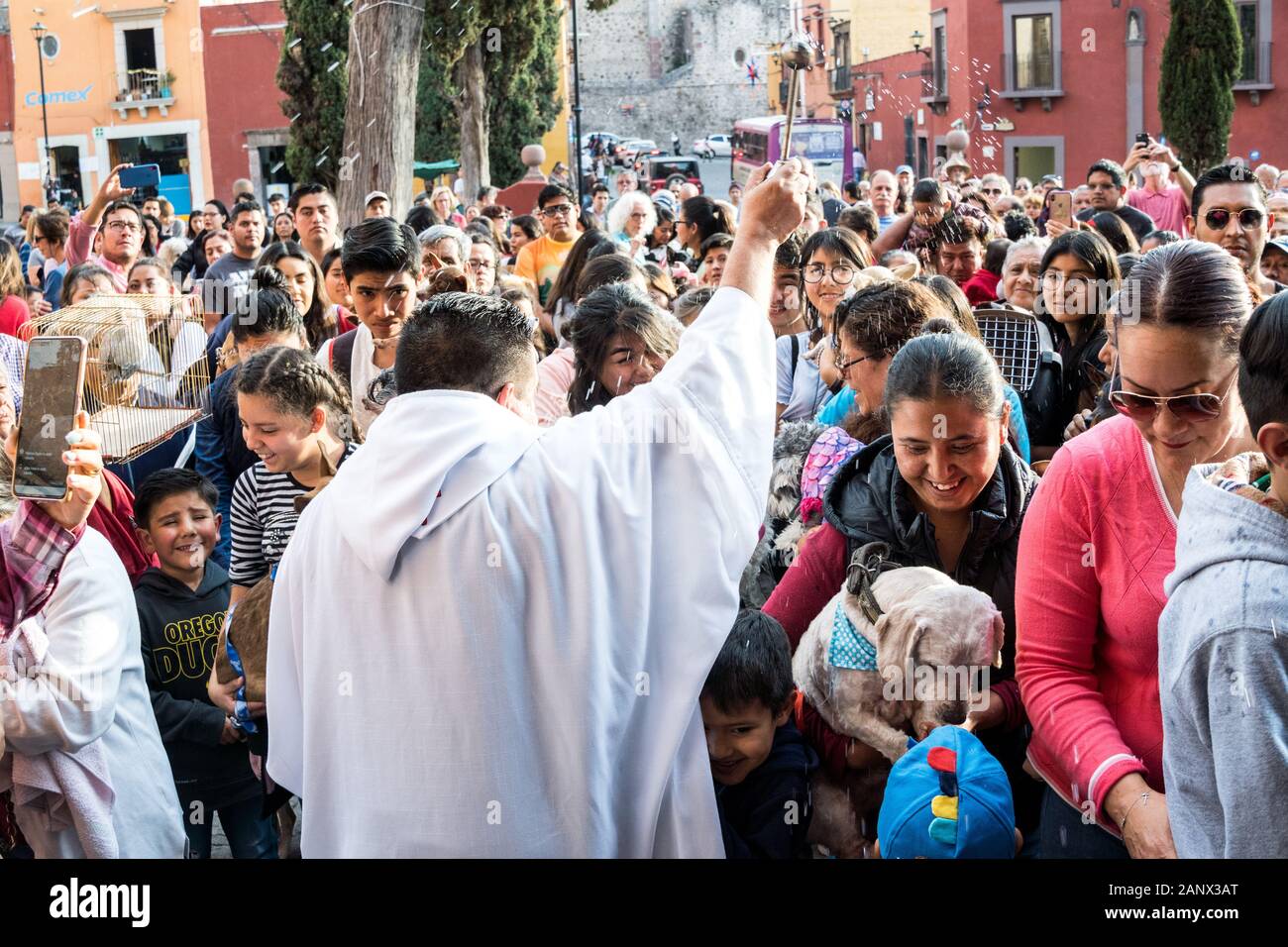 A Roman Catholic priest blesses gathered pets and pet owners during the  annual blessing of the animals on the feast day of San Antonio Abad at  Oratorio de San Felipe Neri church