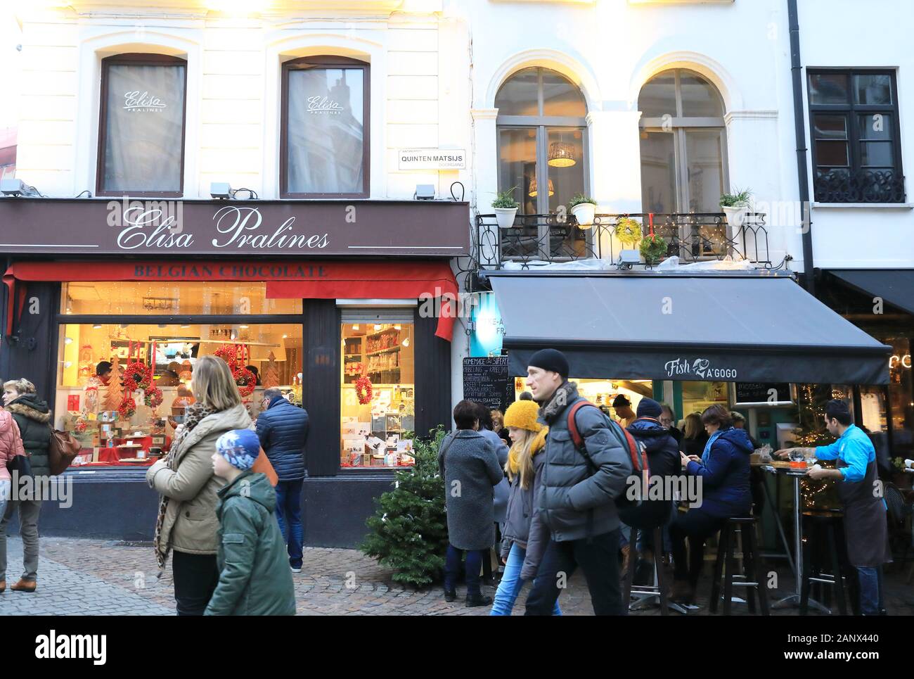 Belgian chocolate shop & Fish a'gogo, a popular little seafood restaurant just off Grote Markt, on Quinten Matsijs, in Antwerp, Belgium Stock Photo