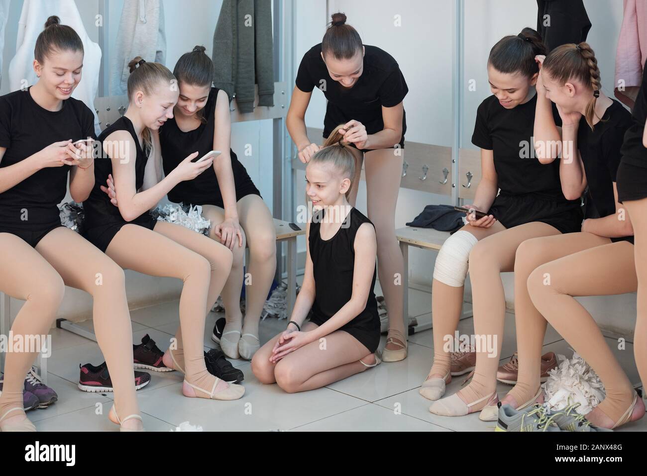 Preparing for cheerleading training Stock Photo