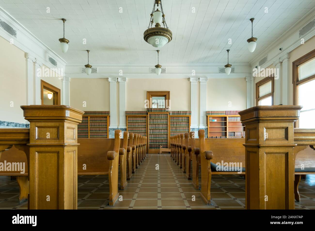 The Dalles, Oregon - April 22, 2016: Lawbooks Shelved at the Back of a Courtroom in the Wasco County Courthouse Stock Photo