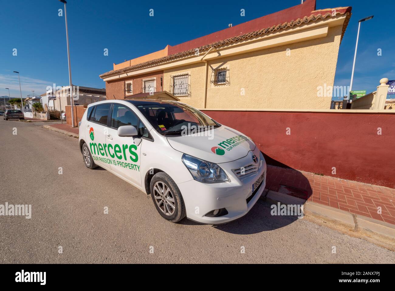 Mercers estate agent car visiting properties in Camposol, Costa Calida, Spain, EU. Real estate business. Spanish property market popular with British Stock Photo