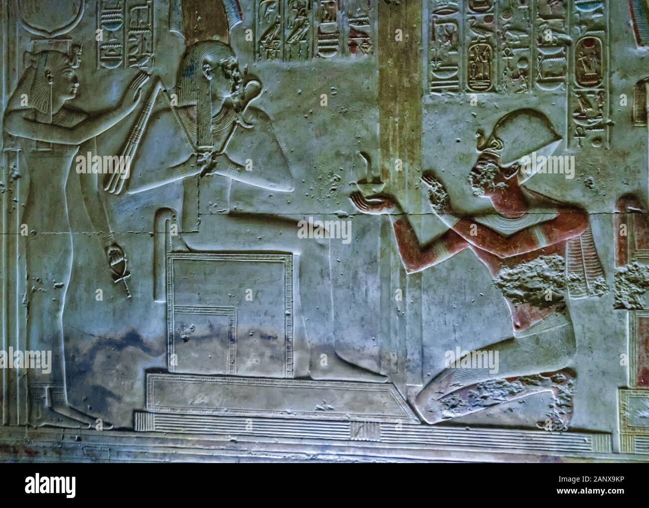 A frieze of Pharaoh Seti worshiping Osiris, from the North wall of the Chapel of Osiris at the Abydos Temple of King Seti I Stock Photo