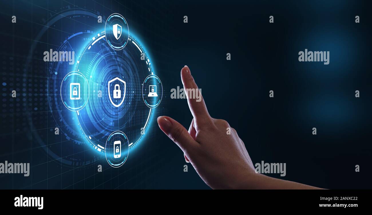 Cyber security data protection business technology privacy concept. Young businessman  select the icon security on the virtual display. Stock Photo