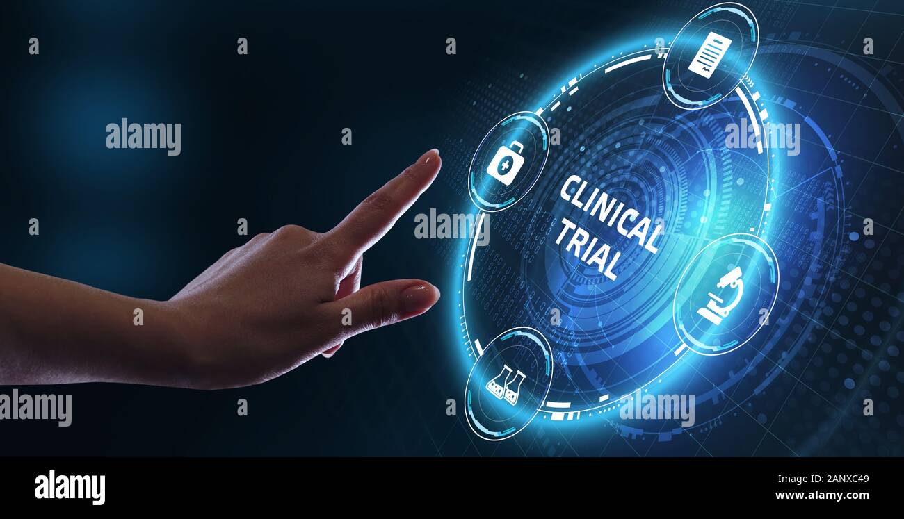 Business, Technology, Internet and network concept. Business man working on the tablet of the future, select on the virtual display: Clinical trial Stock Photo