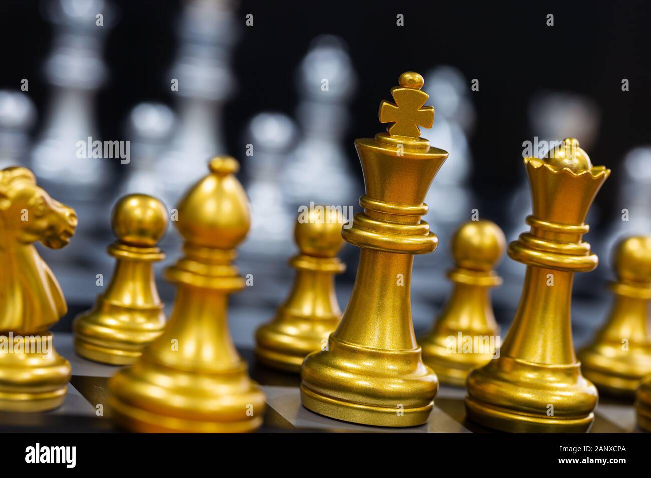 The King in battle chess game stand on chessboard with black