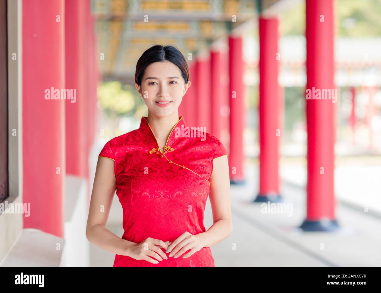 Asian young woman in old traditional Chinese dresses in the Temple Stock Photo