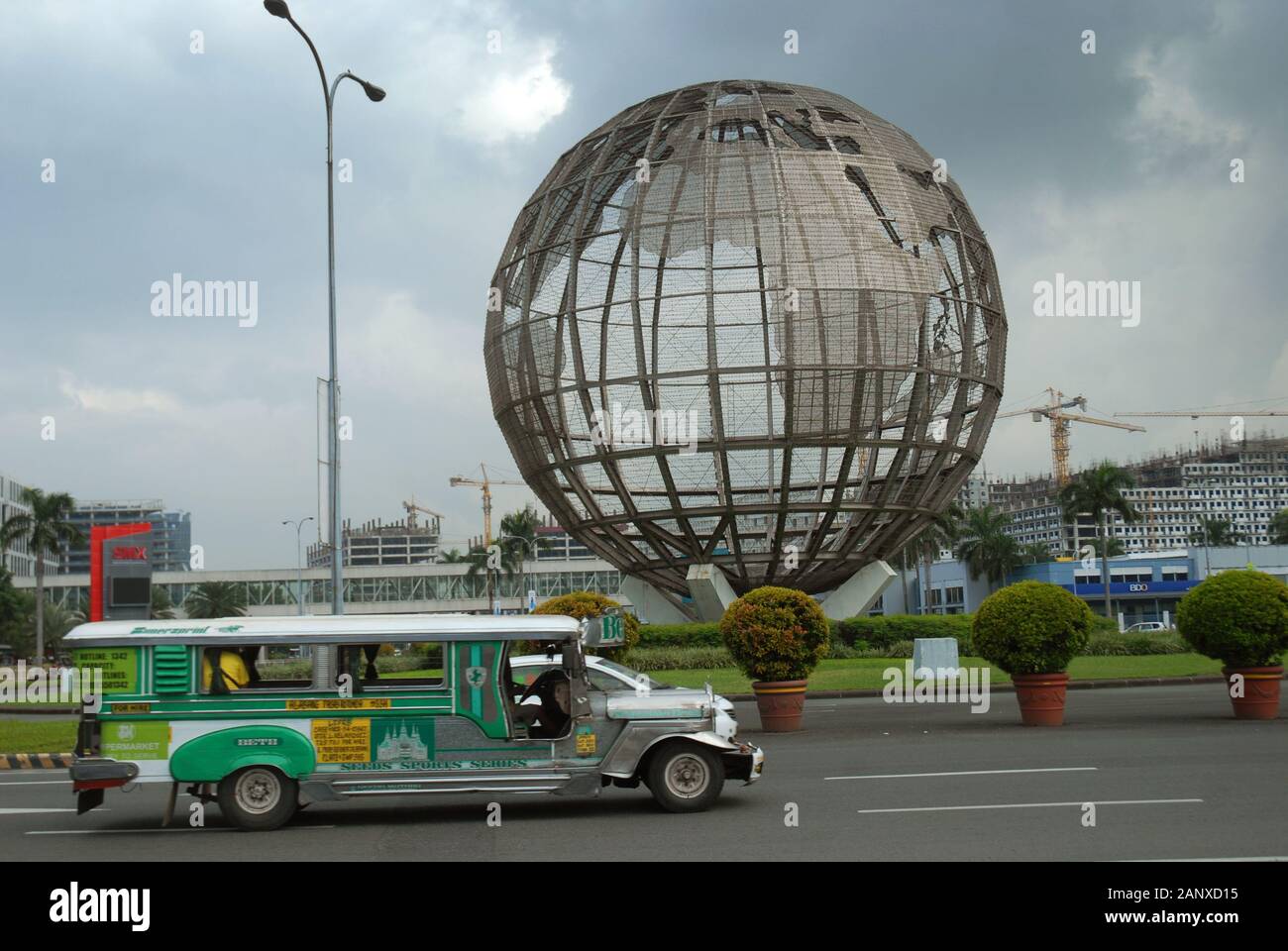 Giant globe at a roundabout outside the Mall of Asia shopping centre ...