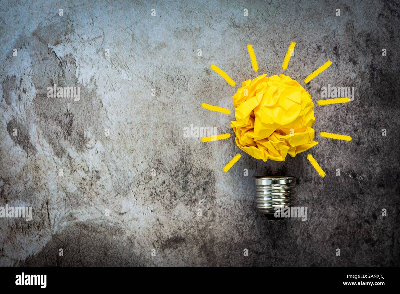 Great idea concept with crumpled yellow paper light bulb Stock Photo