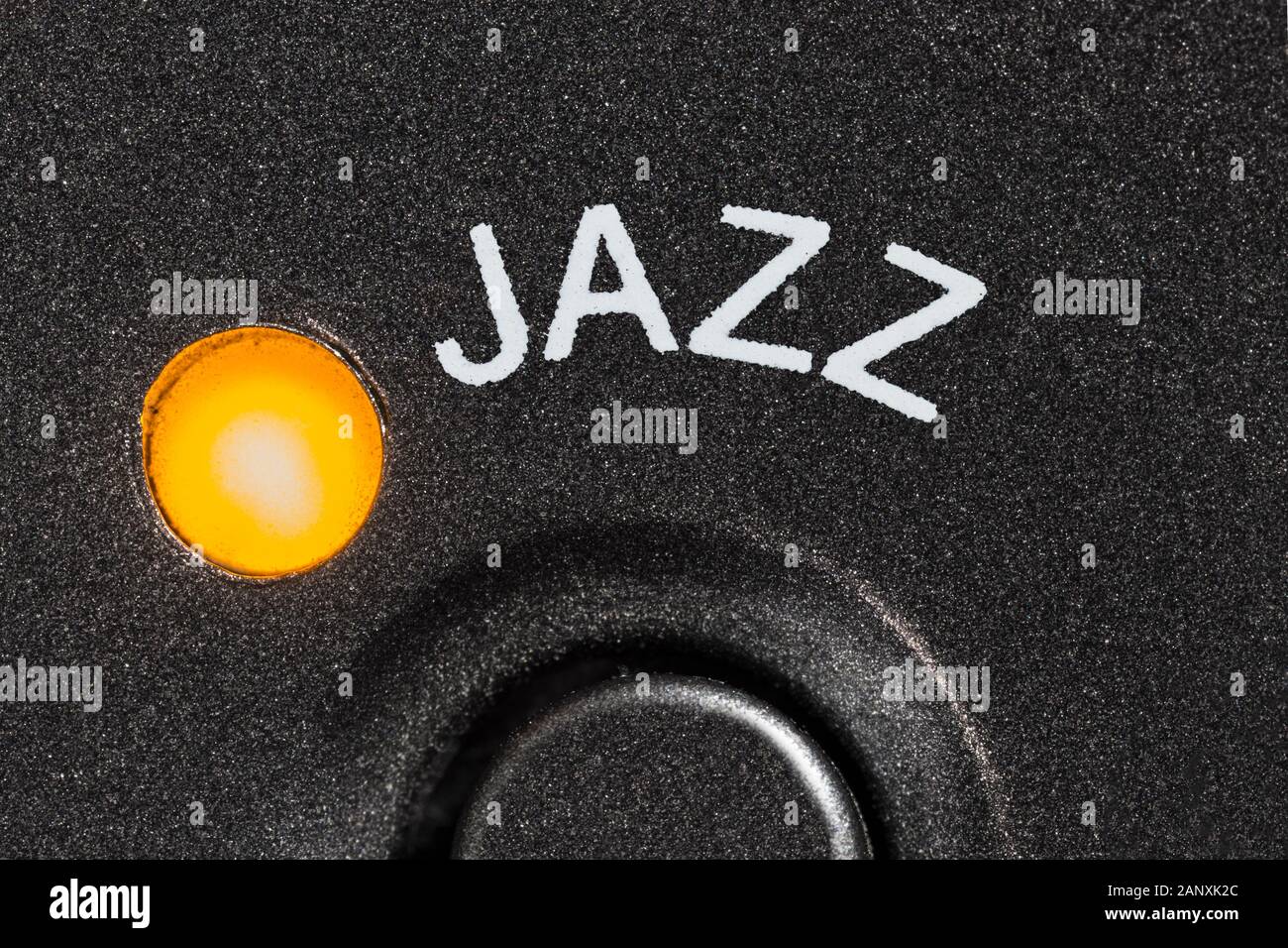 Macro close up photograph of vintage tape machine jazz preset button and indicator light. Stock Photo