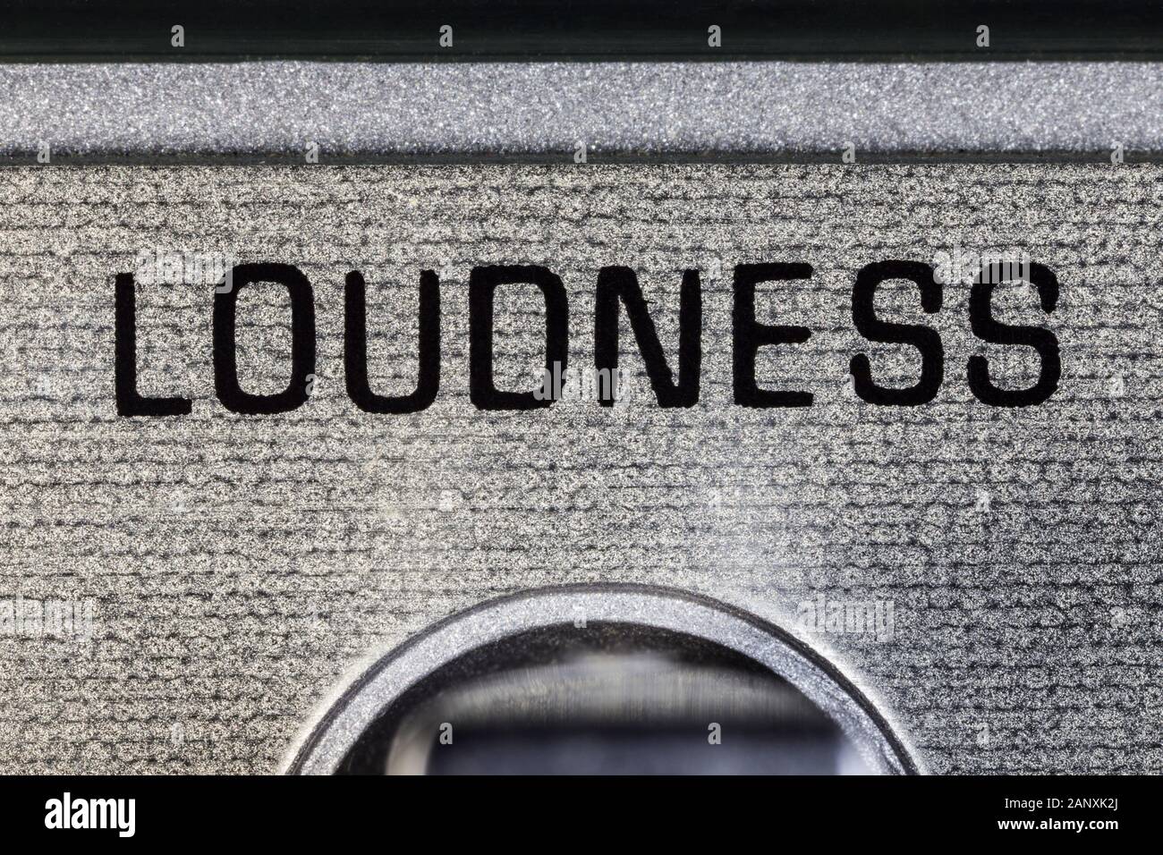 Close up macro photograph of loudness switch on vintage boombox. Stock Photo