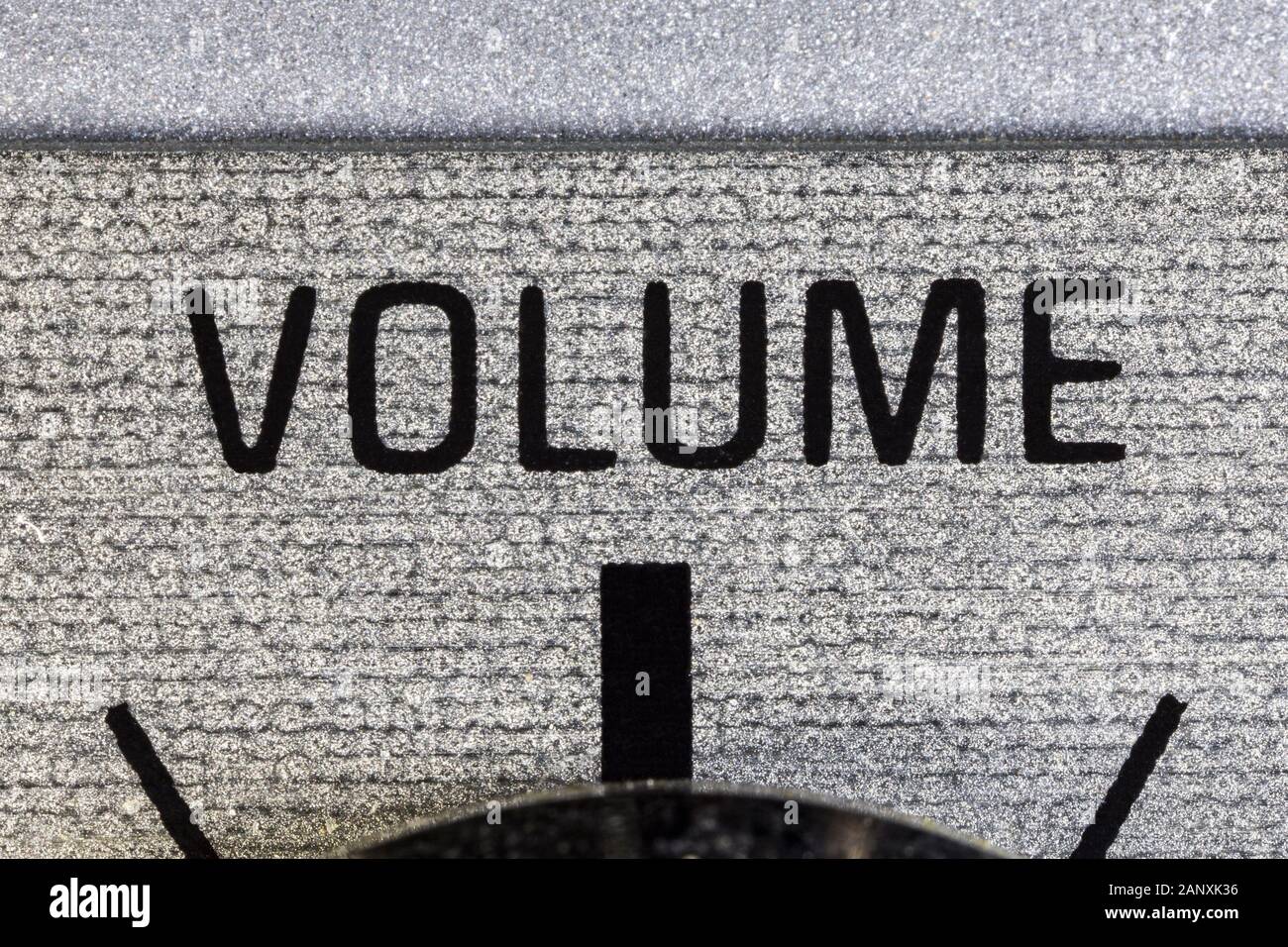 Closeup macro photograph of volume dial on vintage boombox stereo. Stock Photo