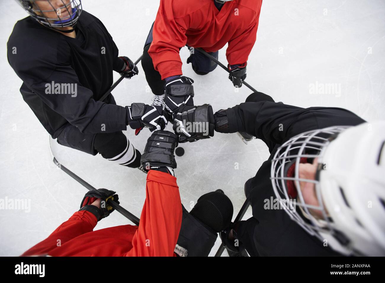 Above view background of hockey team huddling ready to start match on