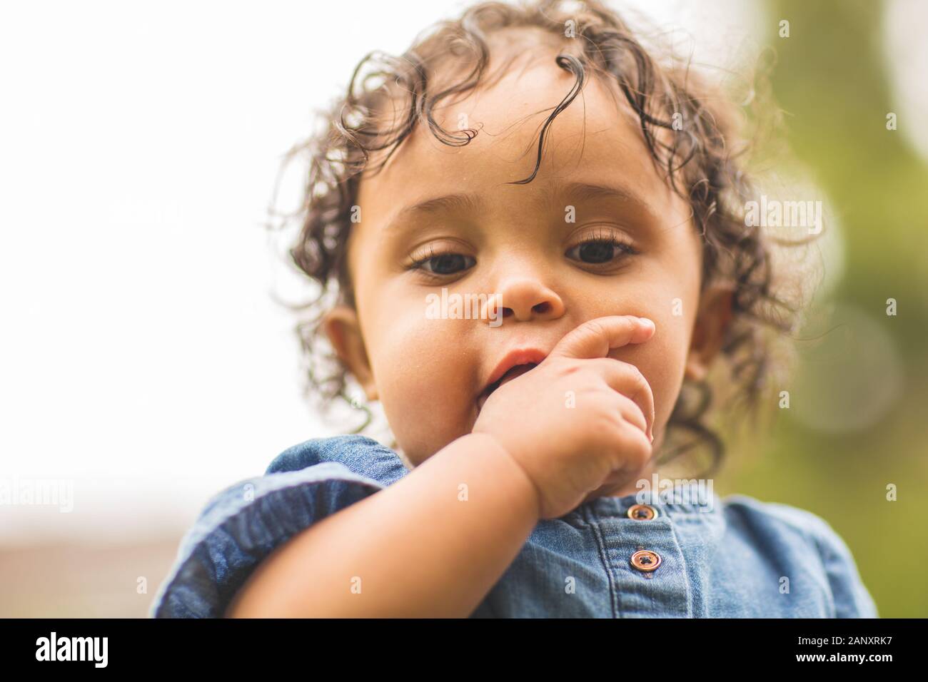 Portrait of a happy mixed race little girl. Stock Photo