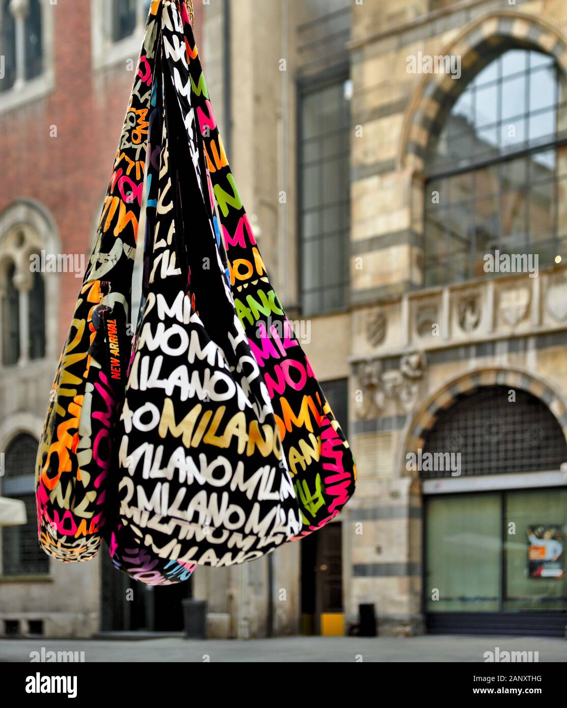 Bags for sale at a kiosk in the ancient Piazza dei Mercanti (Merchants Square) in Milan, Italy, 2015 Stock Photo