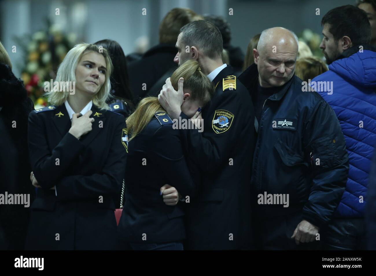 Beijing, Ukraine. 19th Jan, 2020. Staff members of Ukraine International Airlines mourn for plane crash victims during a memorial event at the Boryspil International Airport in Kiev, Ukraine, Jan. 19, 2020. Credit: Sergey Starostenko/Xinhua/Alamy Live News Stock Photo
