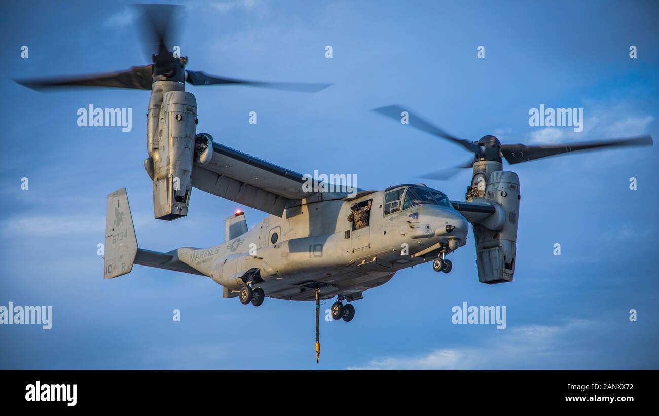 U.S. Marines with Marine Medium Tiltrotor (VMM) 161, attached to Special Purpose Marine Air-Ground Task Force – Crisis Response – Central Command (SPMAGTF-CR-CC) 19.2, fly an MV-22 Osprey during helicopter support team exercise, Jan. 17, 2020. The SPMAGTF-CR-CC is a multiple force provider designed to employ ground, logistics and air capabilities throughout the Central Command area of responsibility. (U.S. Marine Corps photo by Sgt. Branden J. Bourque) Stock Photo