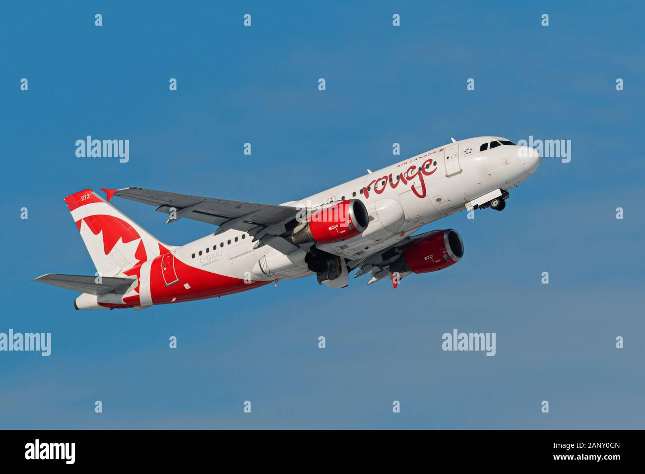 Air Canada Rouge plane Airbus A319 (A321-100) single-aisle narrow body jet airliner airborne after take-off Stock Photo