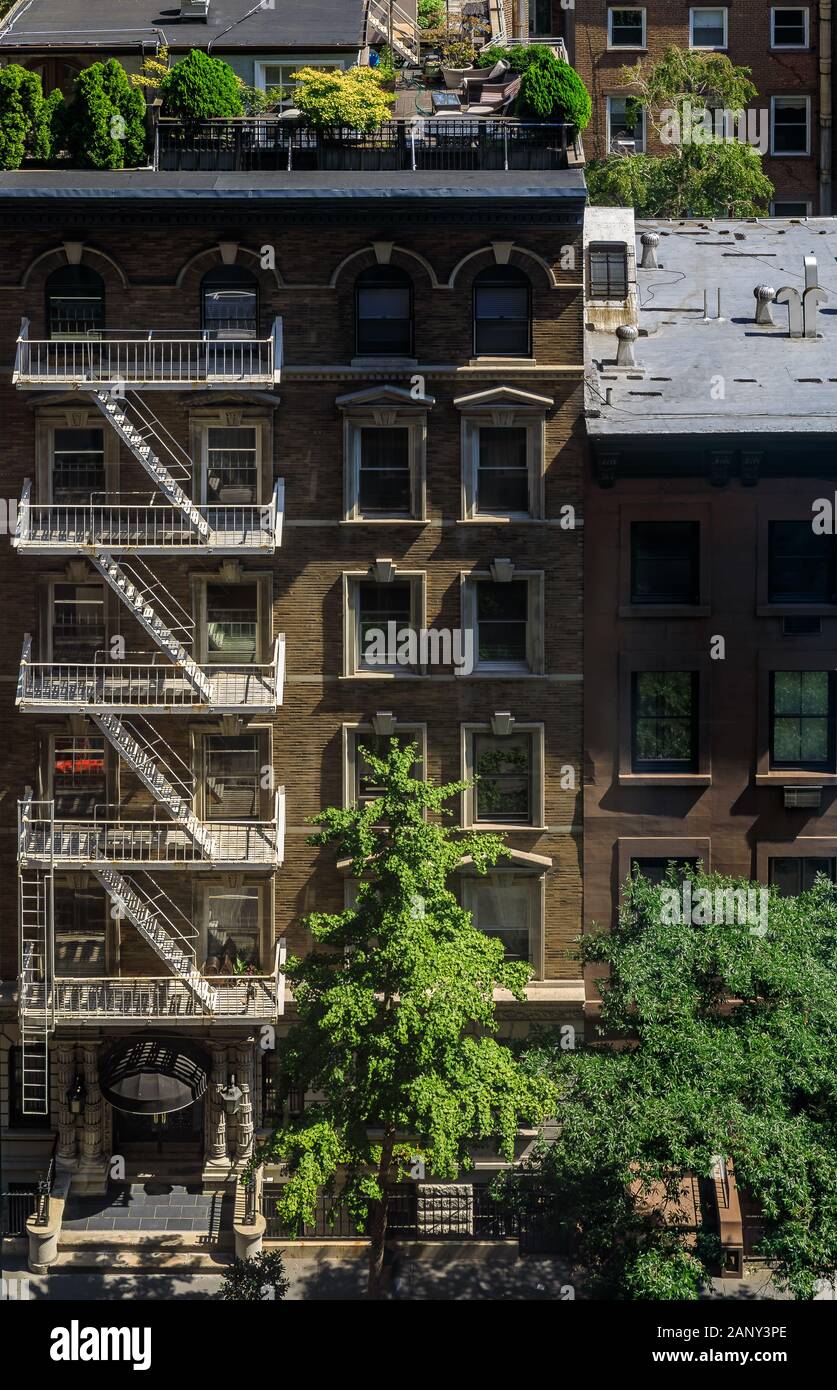 Aerial view of fire escape ladders and balconies in a residential