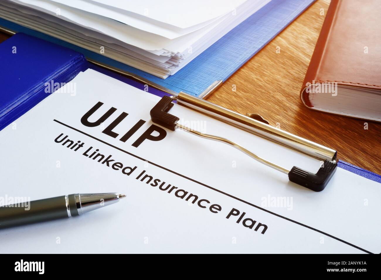 Unit Linked Insurance Plan - ULIP on the table Stock Photo - Alamy