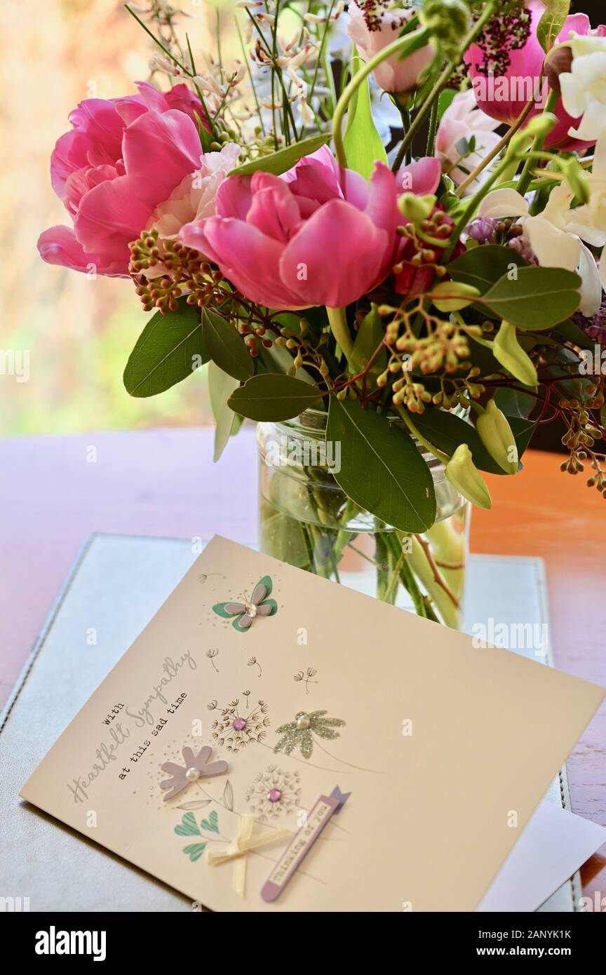 Bereavement. In Sympathy Card with bouquet. Stock Photo