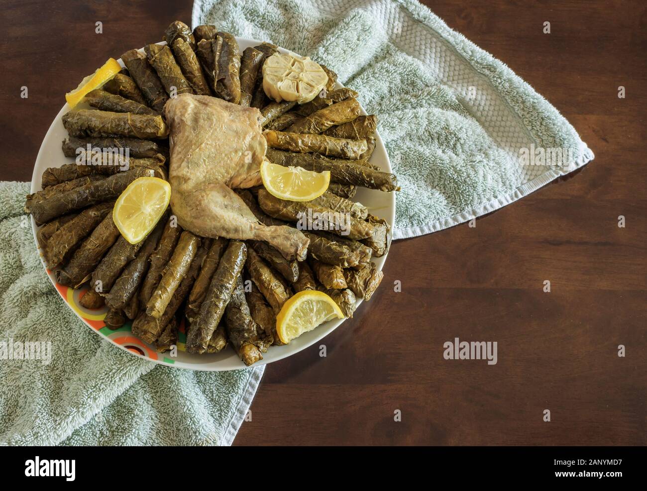 Overhead shot of a traditional Arabian meal with chicken meat served with lemons Stock Photo