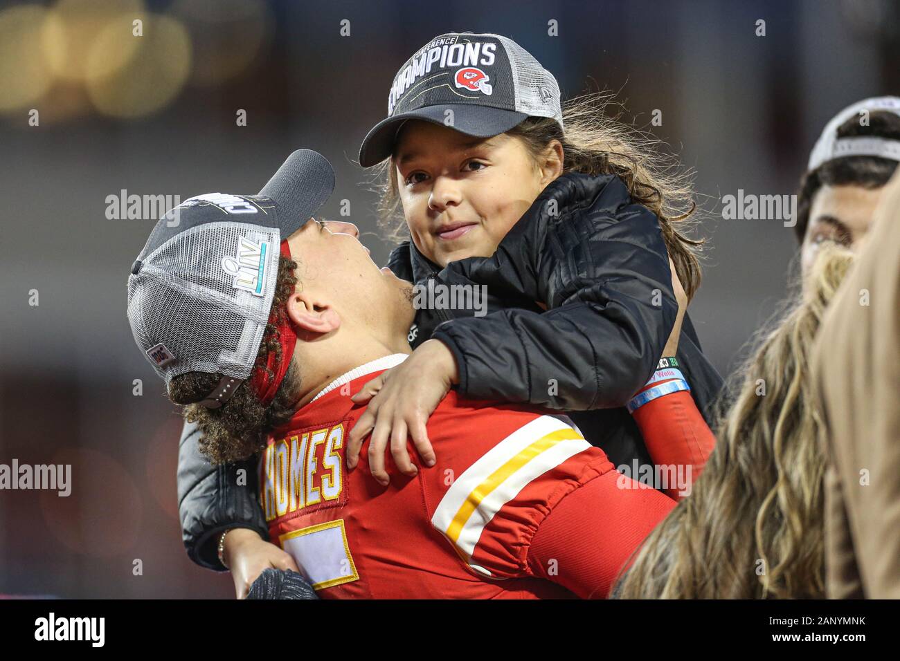 Kansas City Chiefs quarterback Patrick Mahomes (15) holds his sister Mia  Mahomes after the AFC Championship against the Tennessee Titans, Sunday,  Jan 19, 2020, in Kansas City, Mo. The Chiefs beat the
