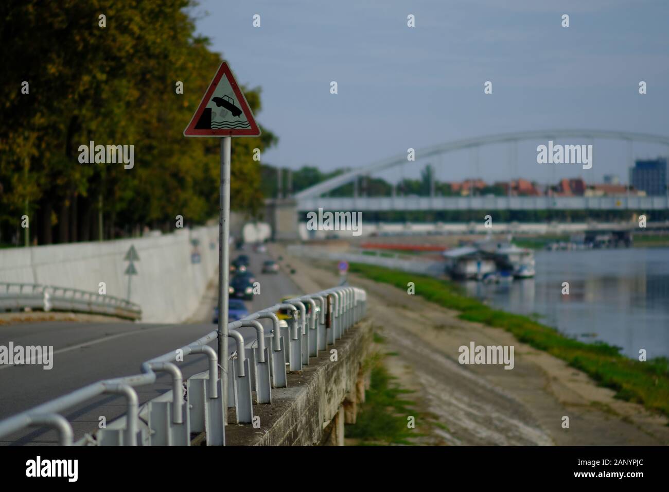 a danger sign near a river in hungary Stock Photo