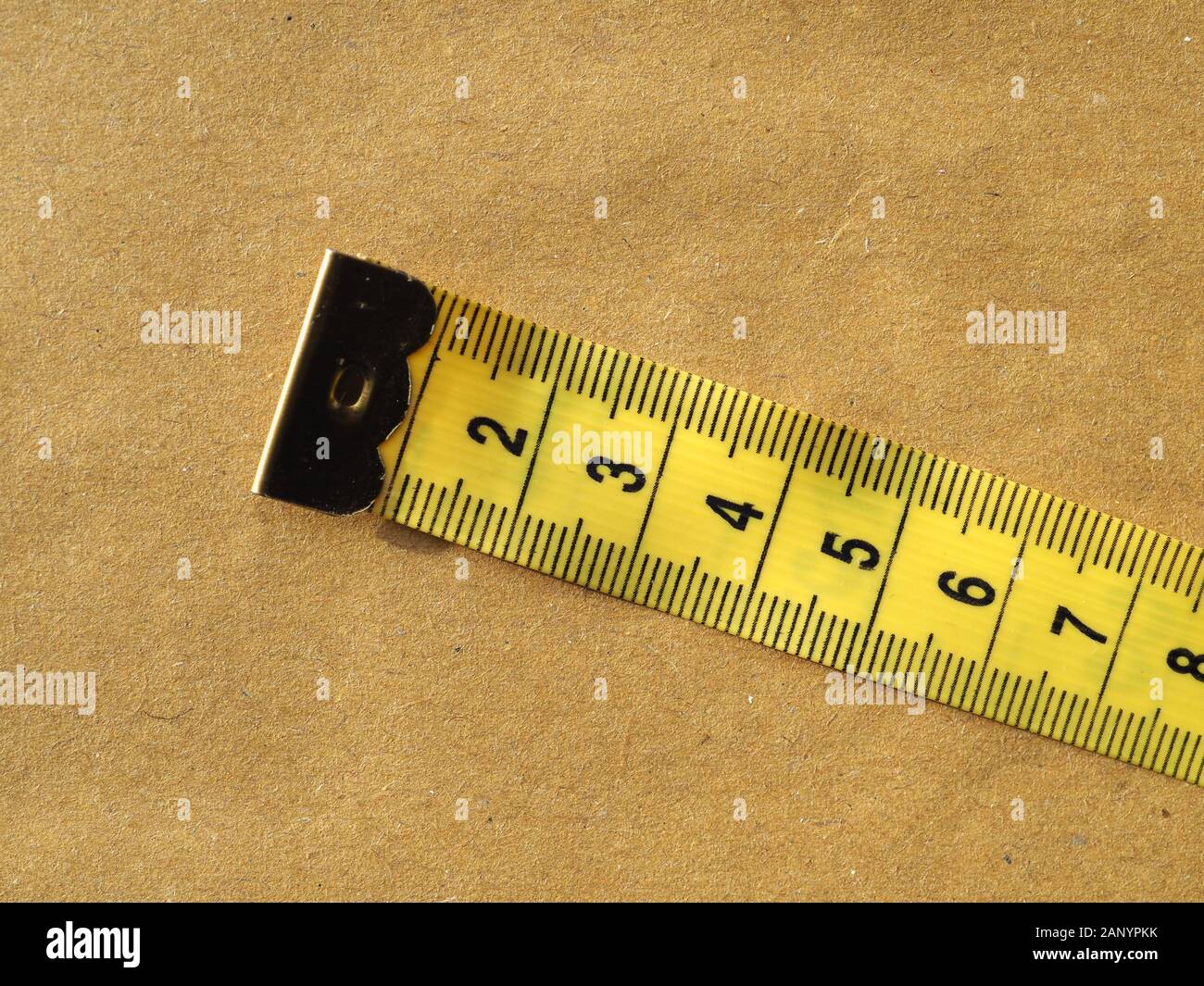 https://c8.alamy.com/comp/2ANYPKK/metric-measuring-tape-flexible-ruler-ribbon-for-tailoring-2ANYPKK.jpg